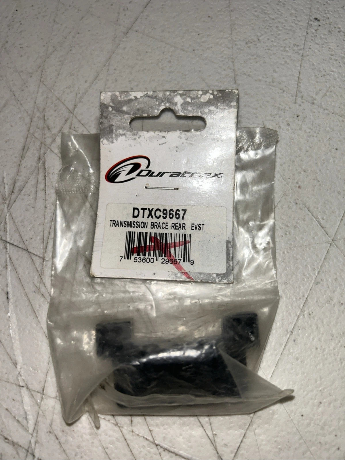 DURATRAX – DTXC9667 – TRANSMISSION BRACE, REAR, EVADER STADIUM